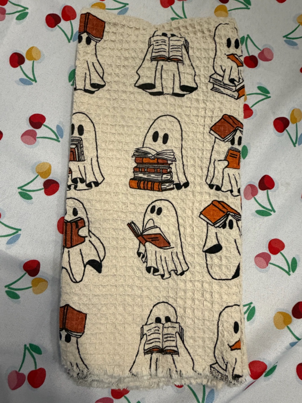 Rachel Zoe Cream Kitchen Towel with Ghosts and Orange Books